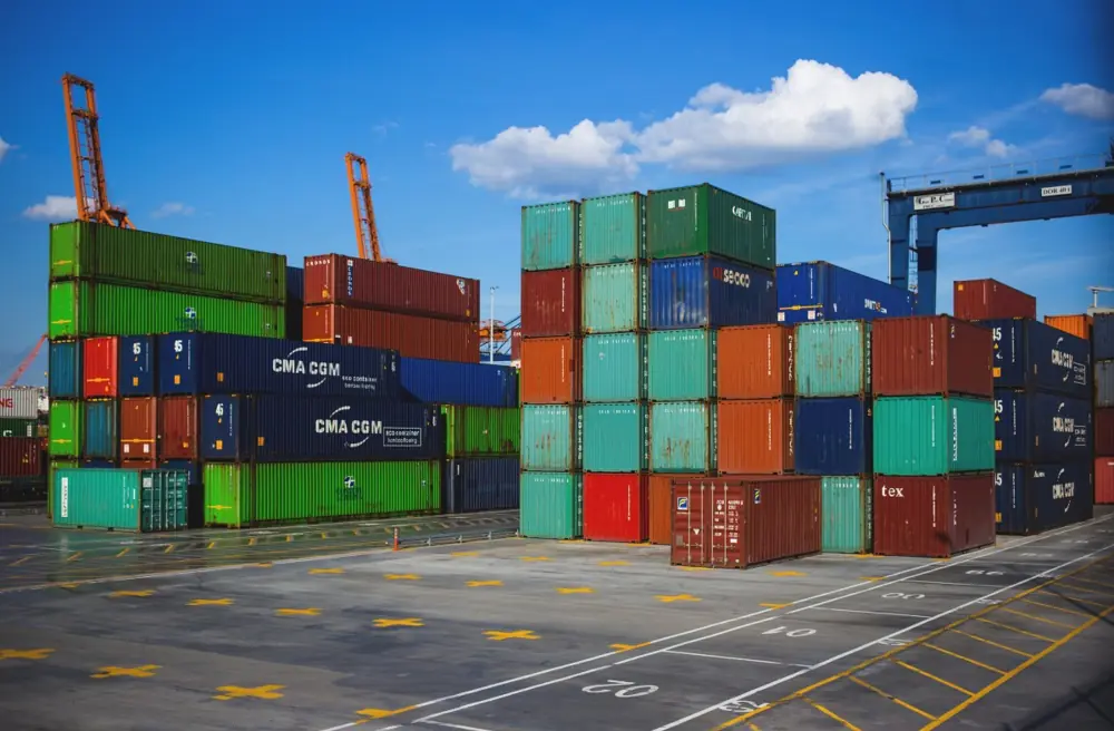 Stacks of shipping containers in a port yard
